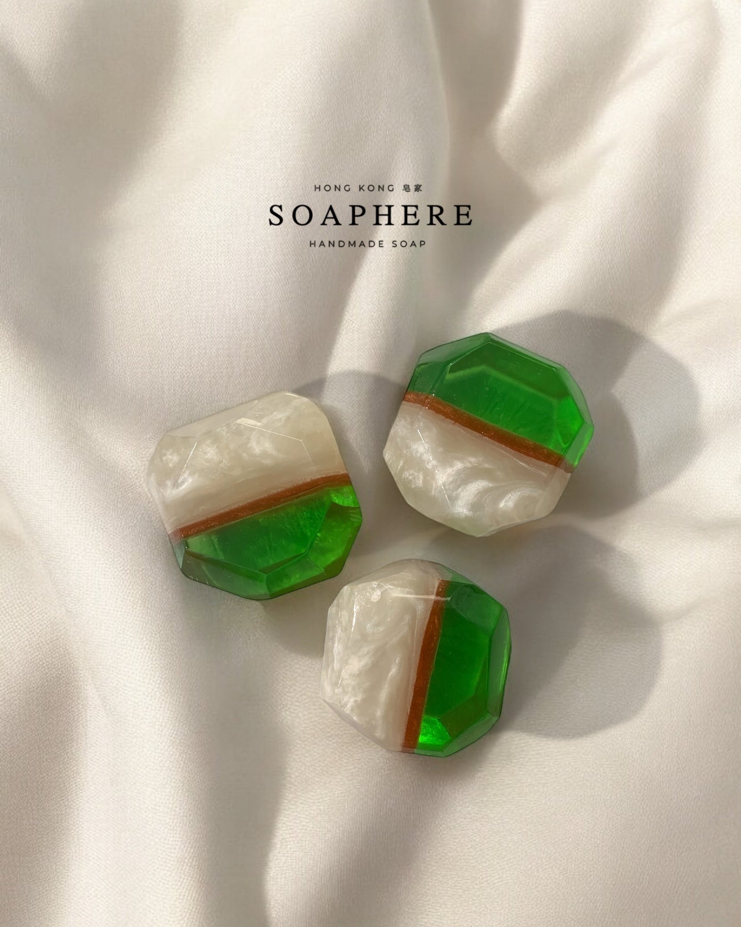 Green and white soap bars with brown stripes.