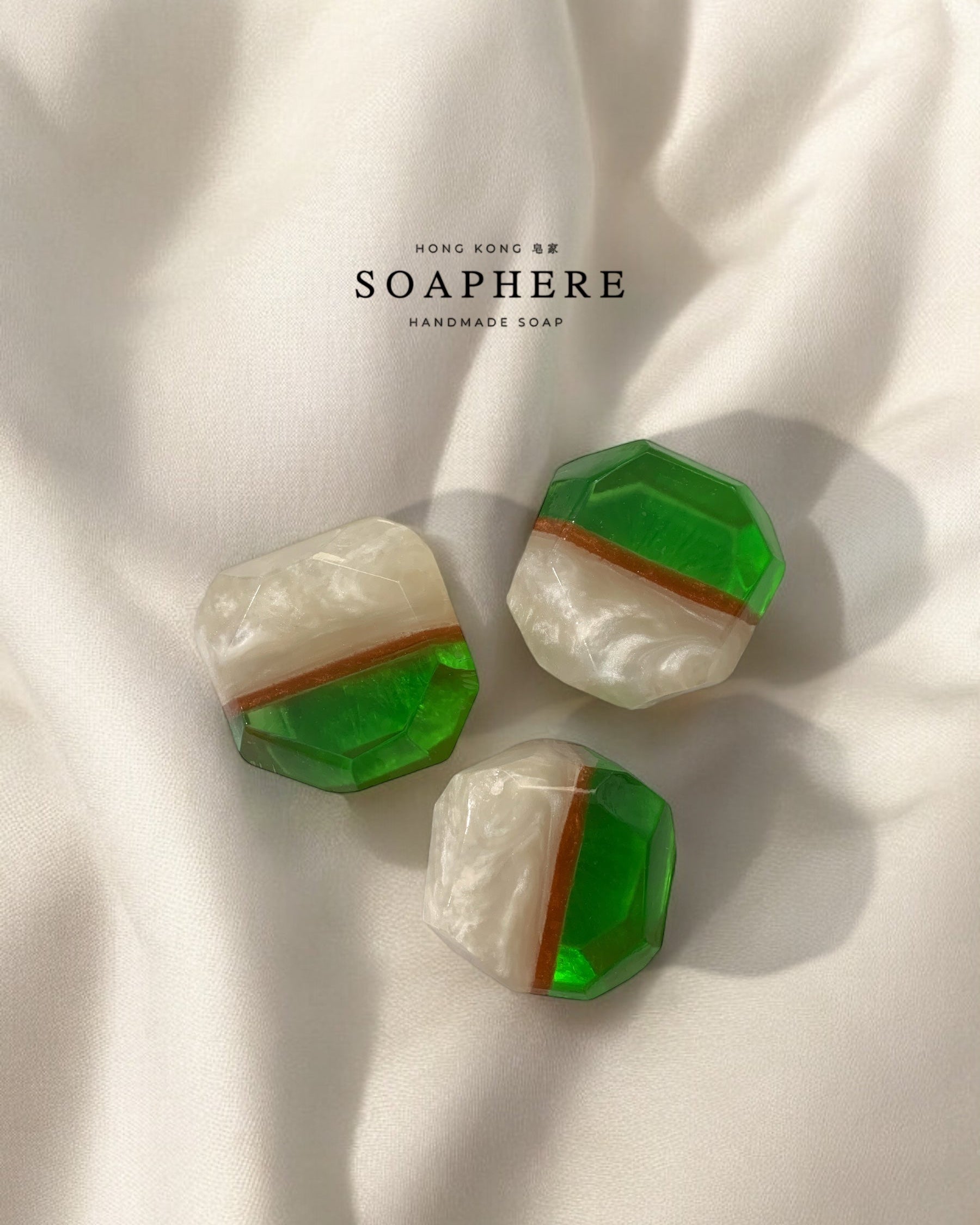 Green and white soap bars with brown stripes.
